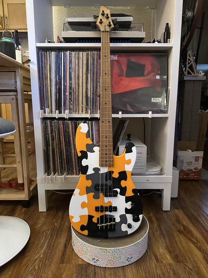 Precision/Jazz Bass and The Thunderbum bass guitar.